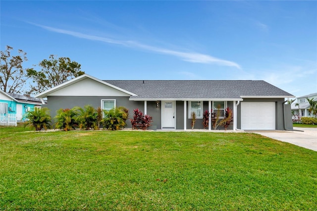 single story home with a garage and a front yard