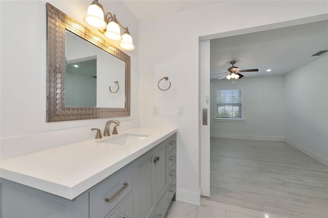 bathroom with vanity and ceiling fan