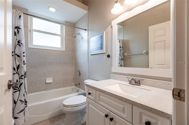 full bathroom featuring toilet, shower / bath combo, tile patterned flooring, and vanity