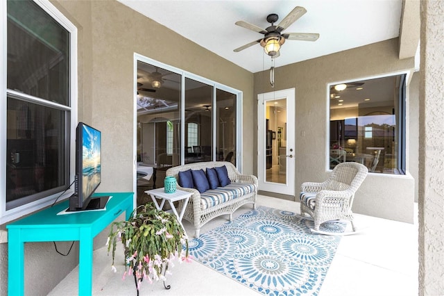 view of patio / terrace featuring ceiling fan and an outdoor hangout area