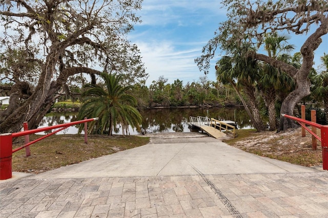 exterior space with a water view