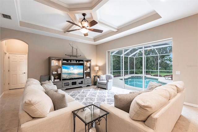 living room featuring coffered ceiling, ceiling fan, and crown molding