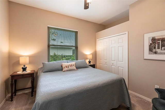 bedroom featuring ceiling fan, carpet flooring, and a closet