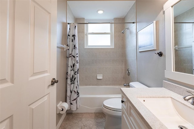 full bathroom featuring shower / tub combo, vanity, tile patterned flooring, and toilet