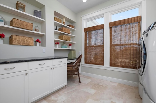 office area featuring built in features, baseboards, and built in study area