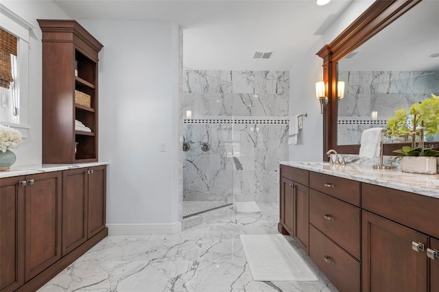 bathroom with vanity, visible vents, a marble finish shower, baseboards, and marble finish floor