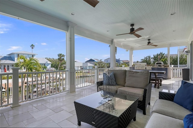 view of patio featuring area for grilling, an outdoor hangout area, and a ceiling fan