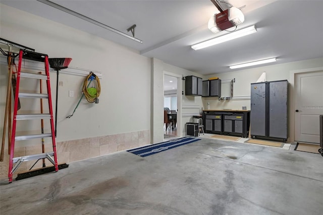 garage featuring a garage door opener