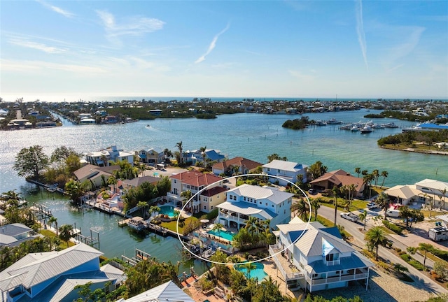 bird's eye view with a water view and a residential view