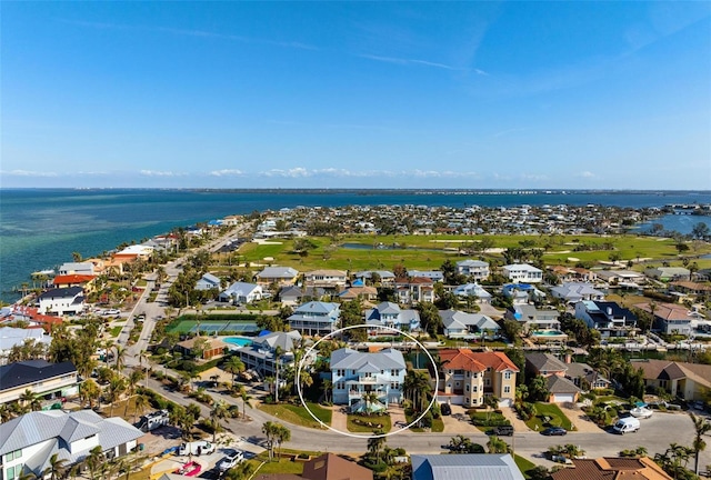 birds eye view of property featuring a water view and a residential view