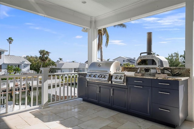 view of patio with area for grilling and a residential view