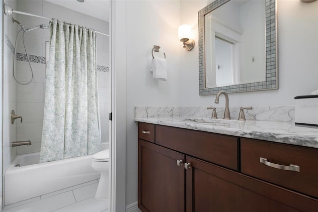 bathroom featuring tile patterned flooring, vanity, shower / tub combo, and toilet