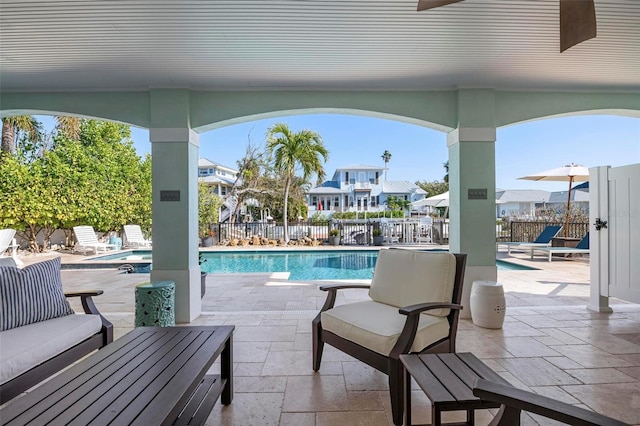 view of patio / terrace with a fenced backyard, a fenced in pool, and a residential view