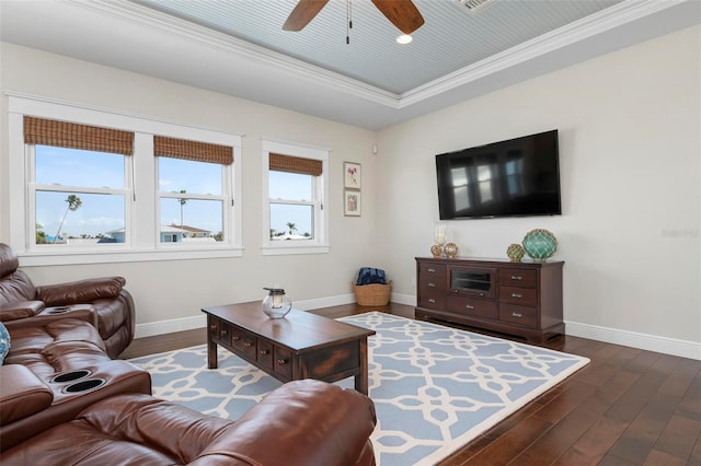 718 Key Royale Dr, Holmes Beach, FL 34217 - living area featuring dark wood finished floors, a ceiling fan, baseboards, and ornamental molding