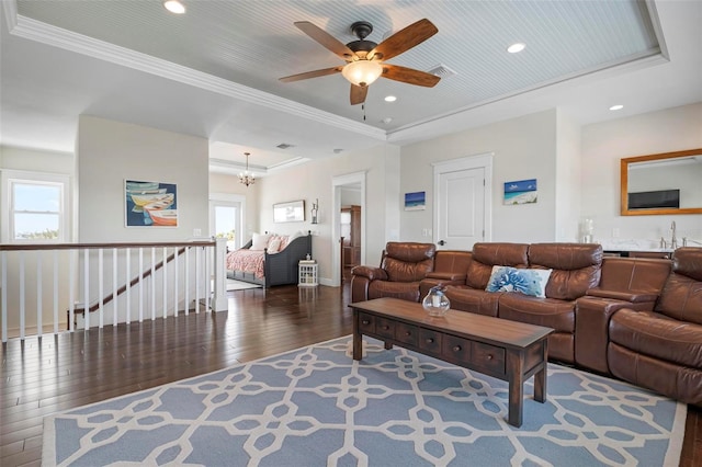 718 Key Royale Dr, Holmes Beach, FL 34217 - living area featuring wood-type flooring, recessed lighting, a ceiling fan, a raised ceiling, and ornamental molding
