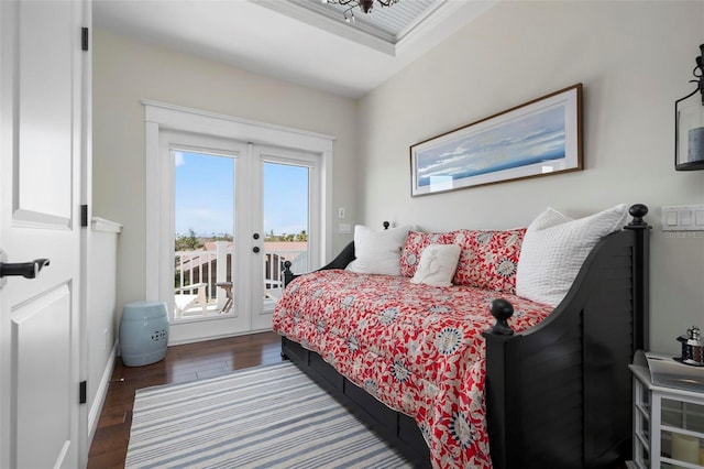 718 Key Royale Dr, Holmes Beach, FL 34217 - bedroom featuring access to outside, french doors, wood finished floors, and baseboards