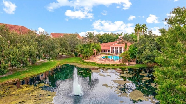 view of community with a pool and a patio area