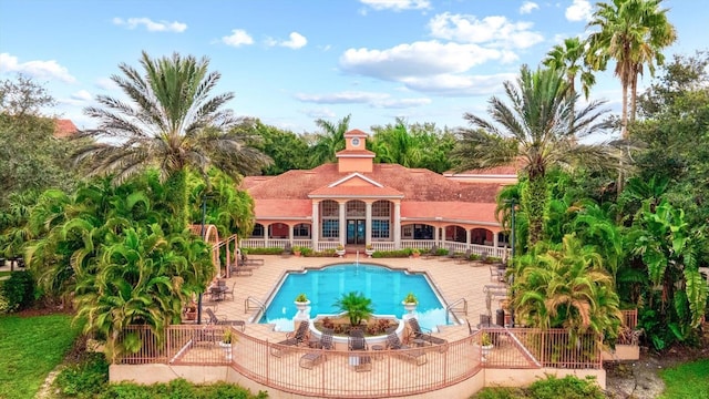 view of swimming pool featuring a patio area