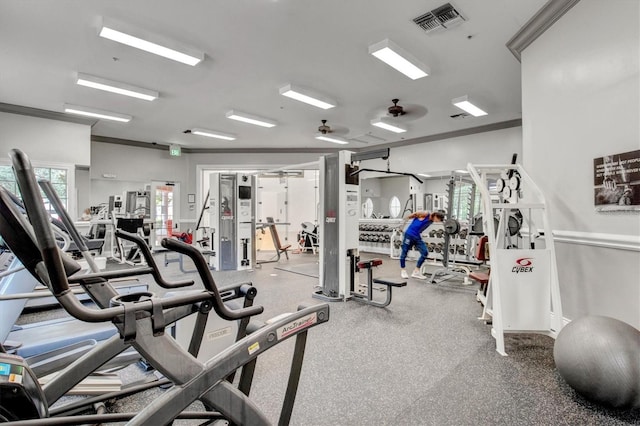 workout area with ornamental molding