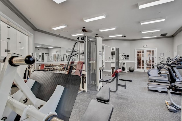 workout area with french doors and crown molding