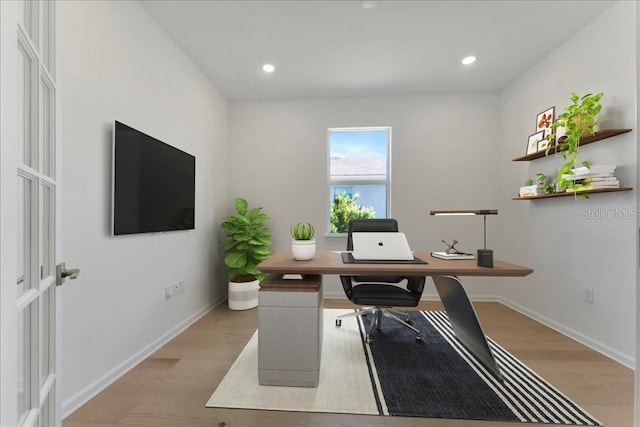 home office featuring light wood-type flooring