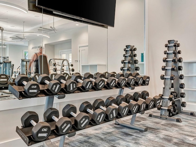 workout area featuring ceiling fan