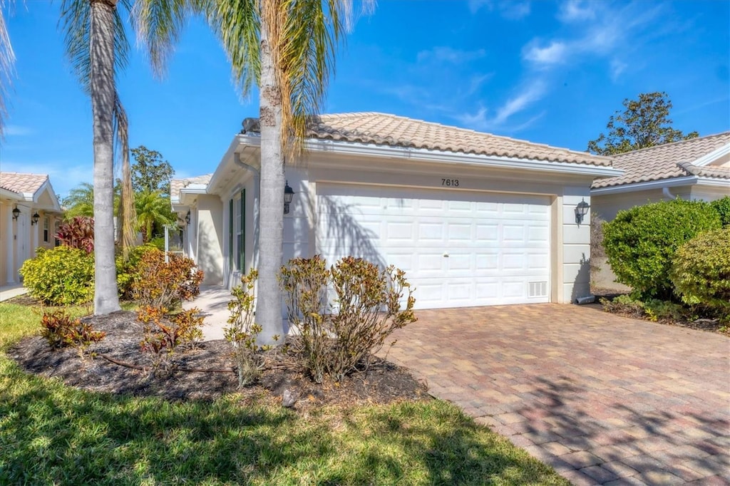 view of front of home with a garage