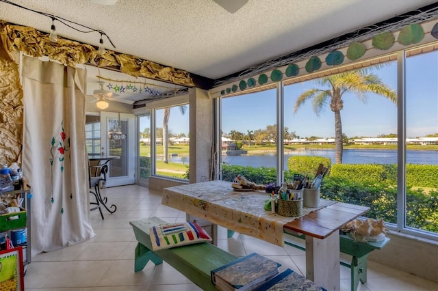 sunroom with a water view