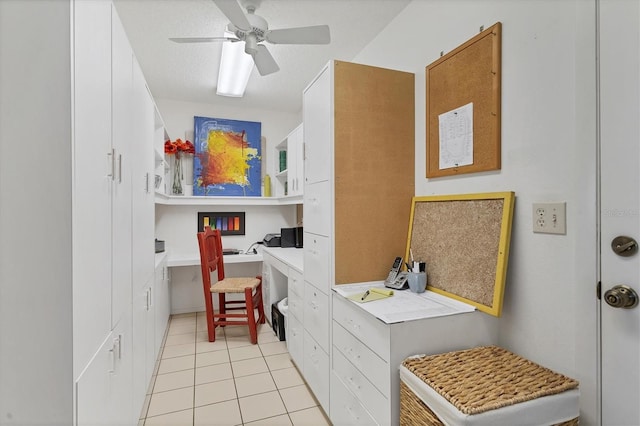 washroom featuring light tile patterned flooring, a textured ceiling, and ceiling fan