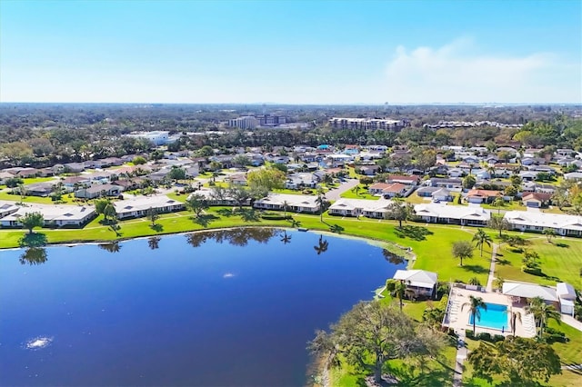 aerial view with a residential view and a water view