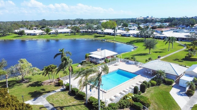 aerial view with a water view and a residential view