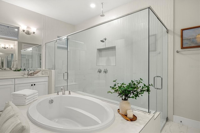 bathroom with independent shower and bath and vanity