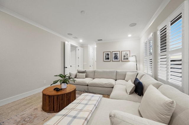 carpeted living room with ornamental molding