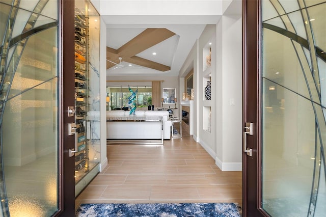 entryway with beam ceiling