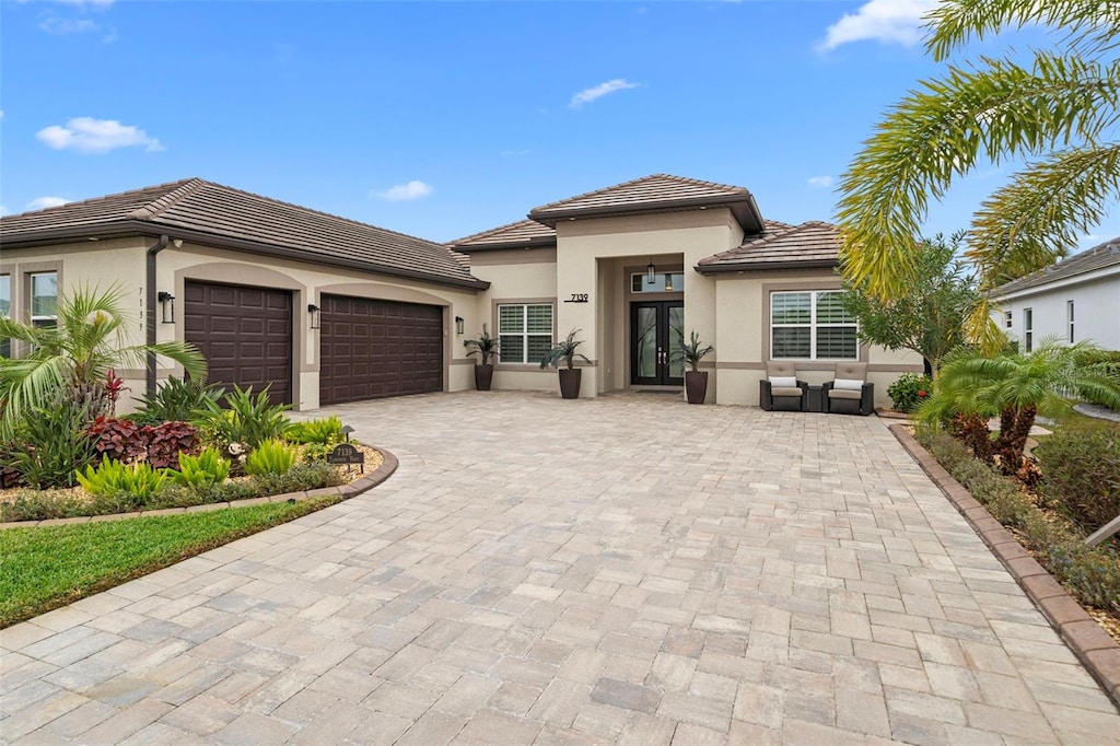 7139 Tamworth Pkwy, Sarasota, FL 34241 - view of front of home featuring a garage