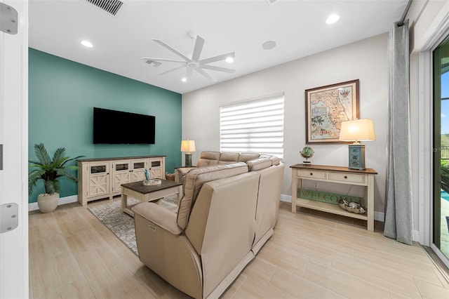 living room with ceiling fan