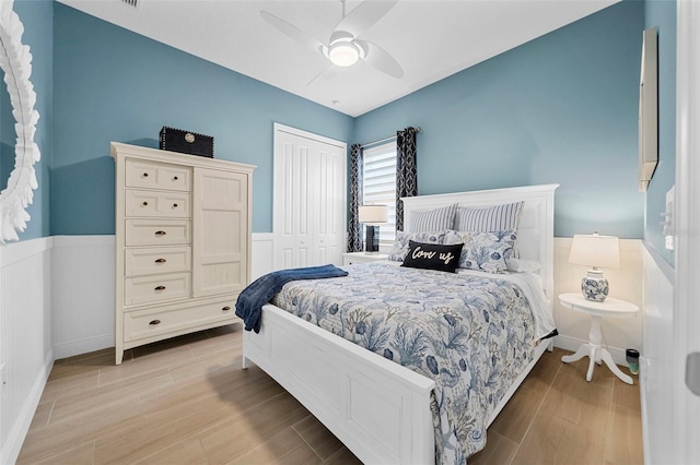 bedroom featuring a closet and ceiling fan