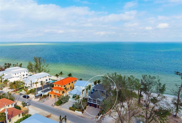 915 N Shore Dr, Anna Maria, FL 34216 - drone / aerial view featuring a water view and a residential view