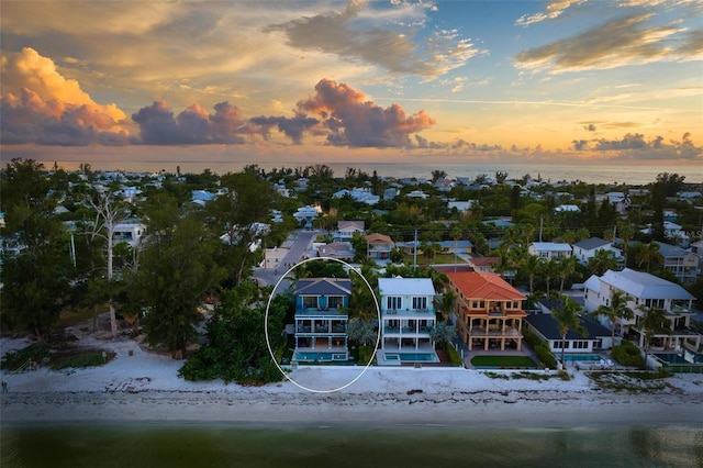 915 N Shore Dr, Anna Maria, FL 34216 - drone / aerial view featuring a residential view, a view of the beach, and a water view