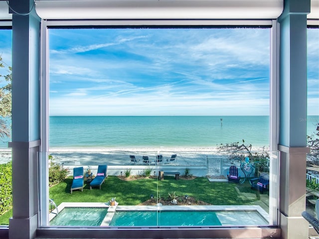 915 N Shore Dr, Anna Maria, FL 34216 - view of pool featuring a water view and a view of the beach