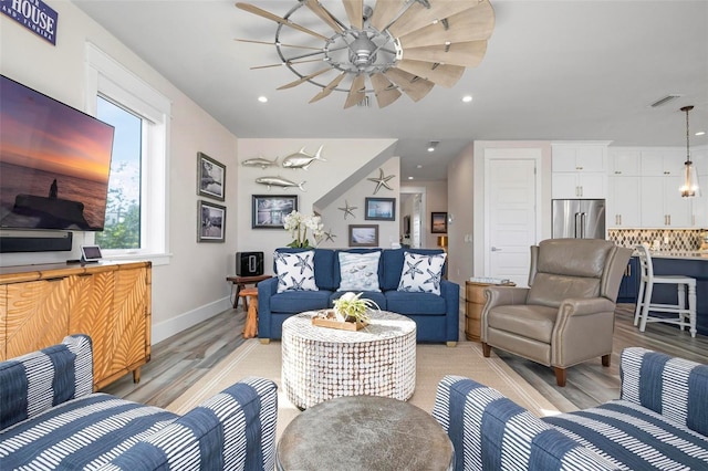 915 N Shore Dr, Anna Maria, FL 34216 - living room featuring ceiling fan, light wood-style floors, recessed lighting, baseboards, and visible vents