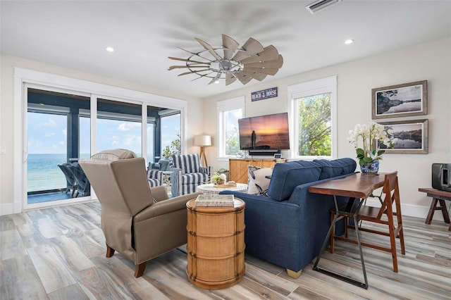 915 N Shore Dr, Anna Maria, FL 34216 - living room with a ceiling fan, visible vents, baseboards, light wood-style floors, and recessed lighting