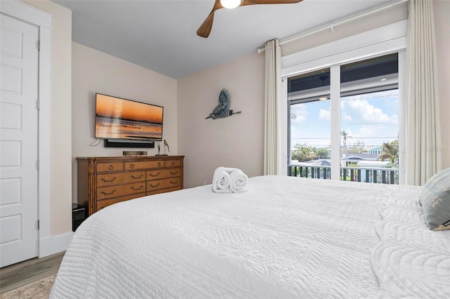 915 N Shore Dr, Anna Maria, FL 34216 - bedroom featuring a ceiling fan, wood finished floors, and access to exterior