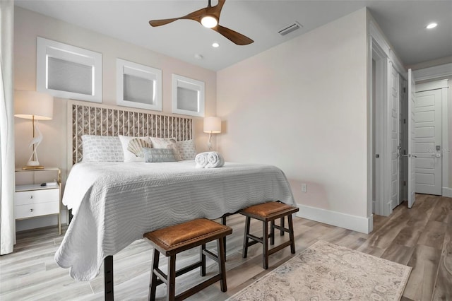 915 N Shore Dr, Anna Maria, FL 34216 - bedroom featuring ceiling fan, recessed lighting, baseboards, light wood-type flooring, and visible vents
