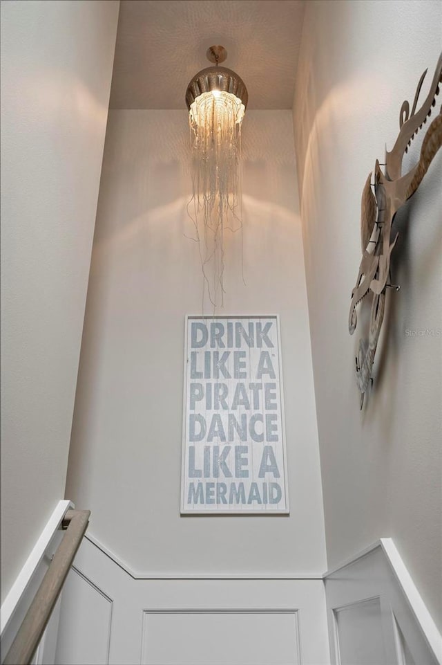 915 N Shore Dr, Anna Maria, FL 34216 - interior details with a notable chandelier
