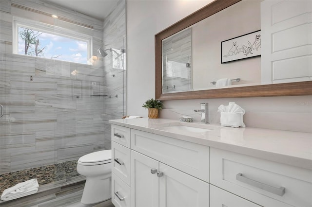 915 N Shore Dr, Anna Maria, FL 34216 - full bath with vanity, wood finished floors, toilet, and a shower stall