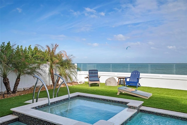 915 N Shore Dr, Anna Maria, FL 34216 - view of pool with a yard, a water view, and a fenced backyard