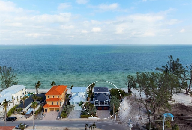 915 N Shore Dr, Anna Maria, FL 34216 - birds eye view of property with a water view and a residential view