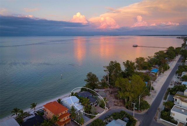 915 N Shore Dr, Anna Maria, FL 34216 - aerial view at dusk featuring a water view
