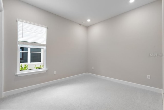 8024 Moonbeam Ave, Sarasota, FL 34241 - carpeted empty room with recessed lighting and baseboards